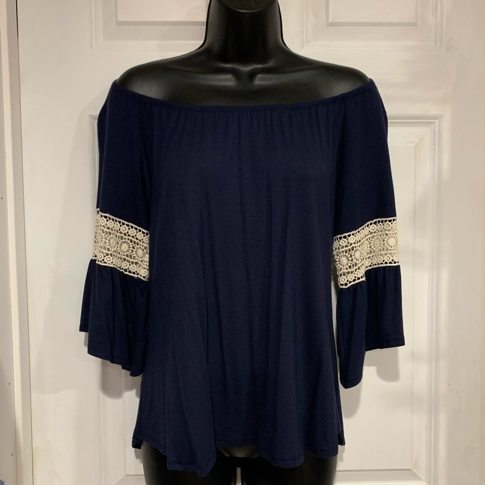Loose summer top-off or on the shoulder
